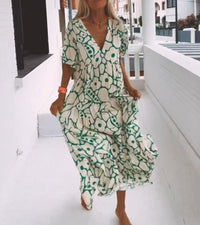 Grünes Maxikleid mit kurzen Ärmeln und Druck – Elisa